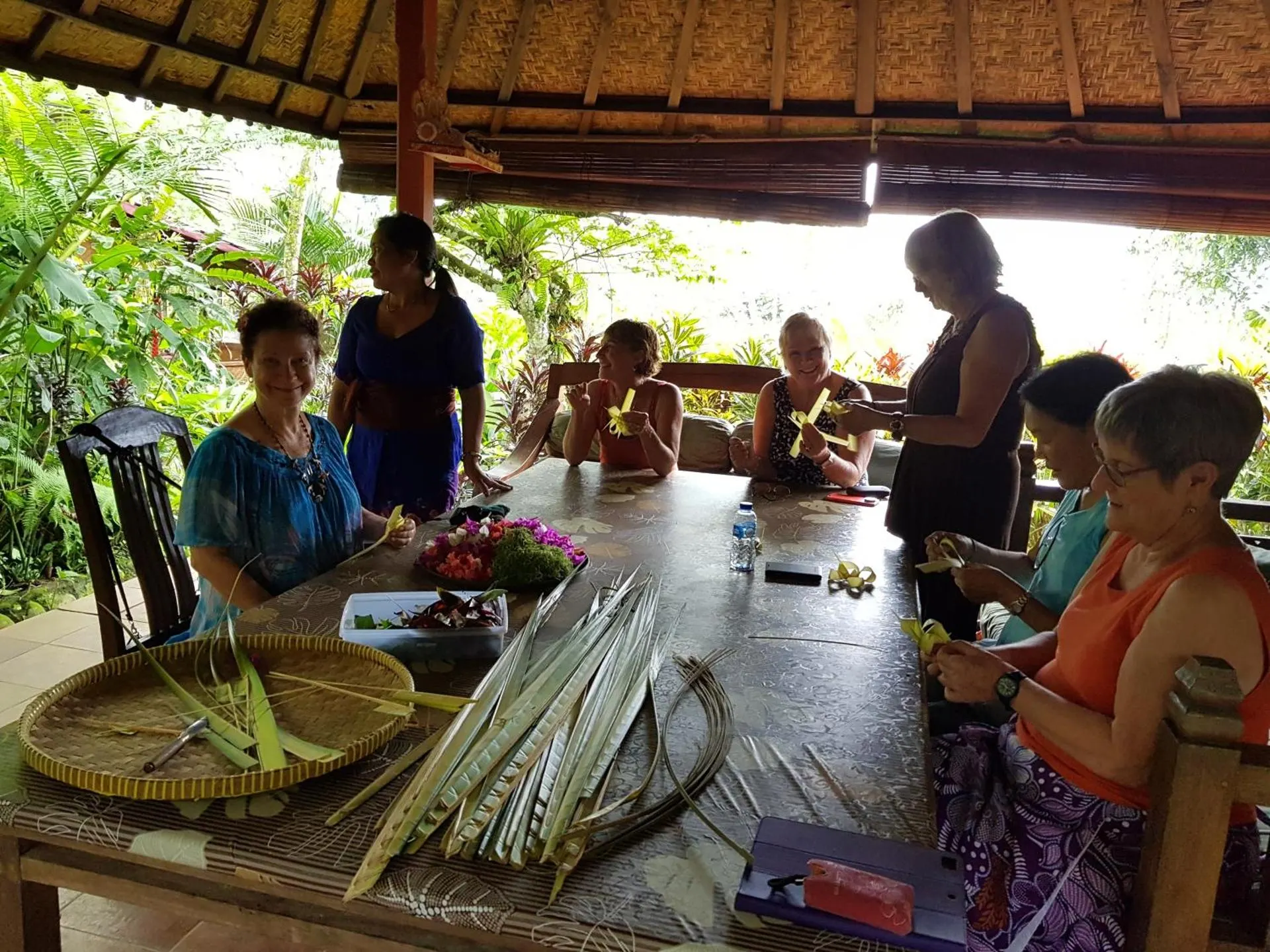 Learning to make traditional Balinese palm-leaf offerings