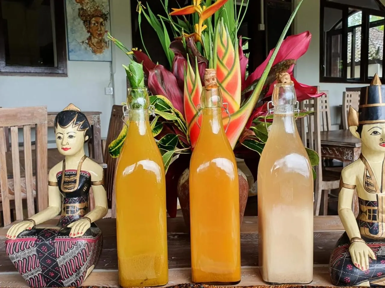 House-made jamu and cold-pressed juices in glass bottles